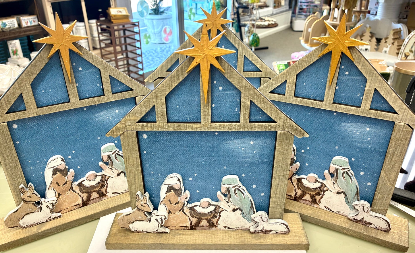 Layered Wood Tabletop Teal Nativity in Crèche