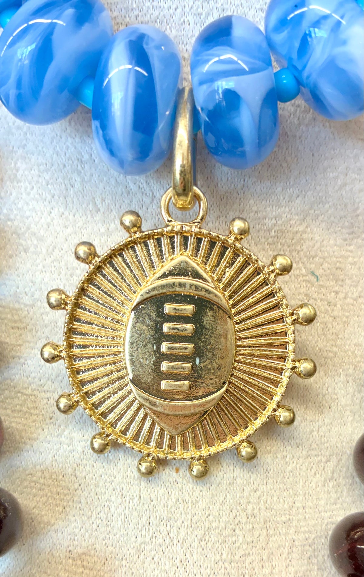 Chunky Beaded Light Blue Necklace with Gold Football Charm