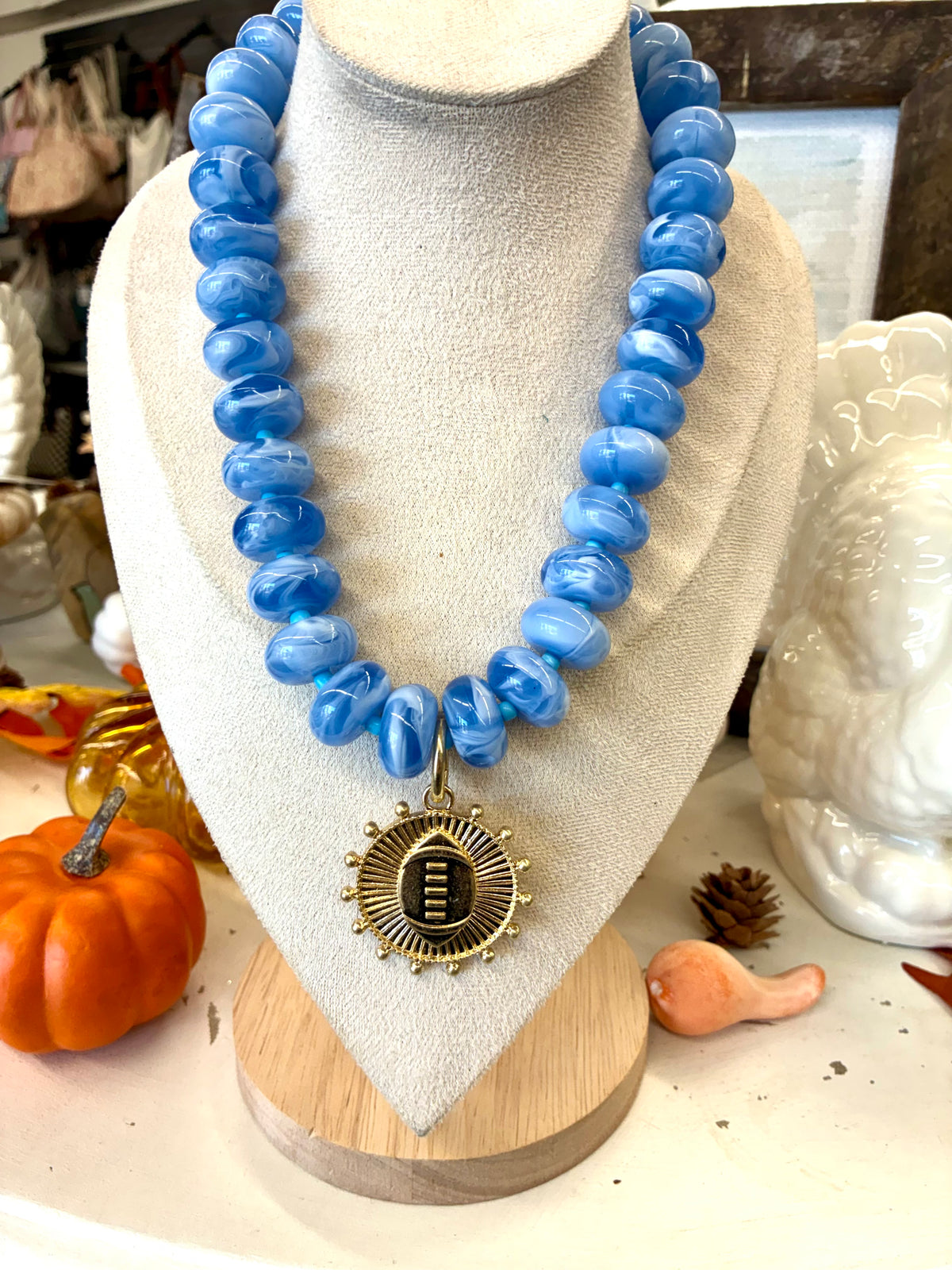 Chunky Beaded Light Blue Necklace with Gold Football Charm