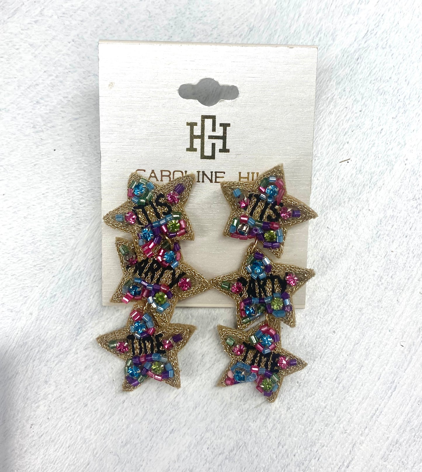 “It’s Party Time” Triple Star Rhinestone Earrings by Caroline Hill.