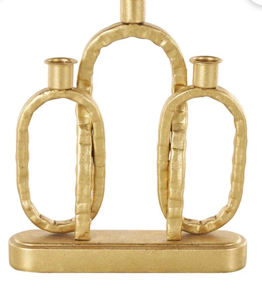 Gold-toned metal interlocking-link decorative candle holder with a rectangular base.