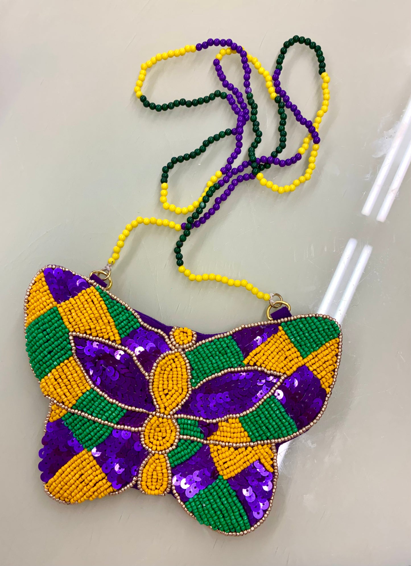 Mardi Gras mask necklace/medallion, hand-beaded coin. Purse with sequins and seed beads in traditional purple, green, and gold colors.
